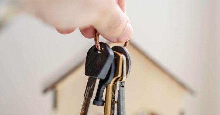 Legal Risks - Person with keys for real estate